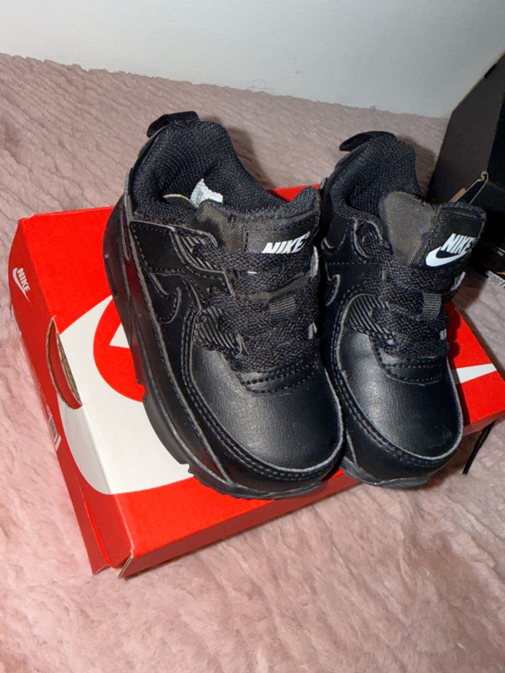 Nike Kids Black Low-Top Sneakers with White Swoosh